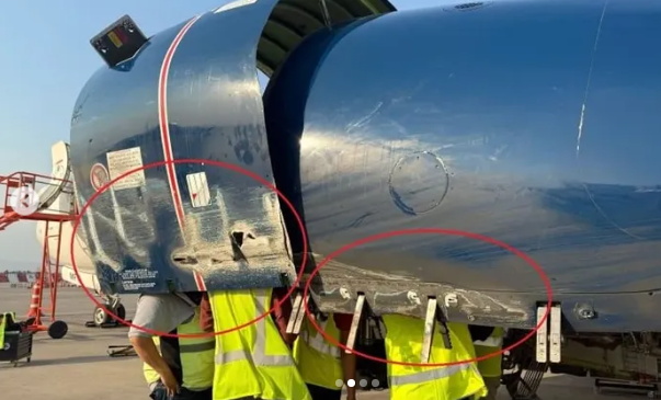 Close-up of damaged left engine on 737 MAX